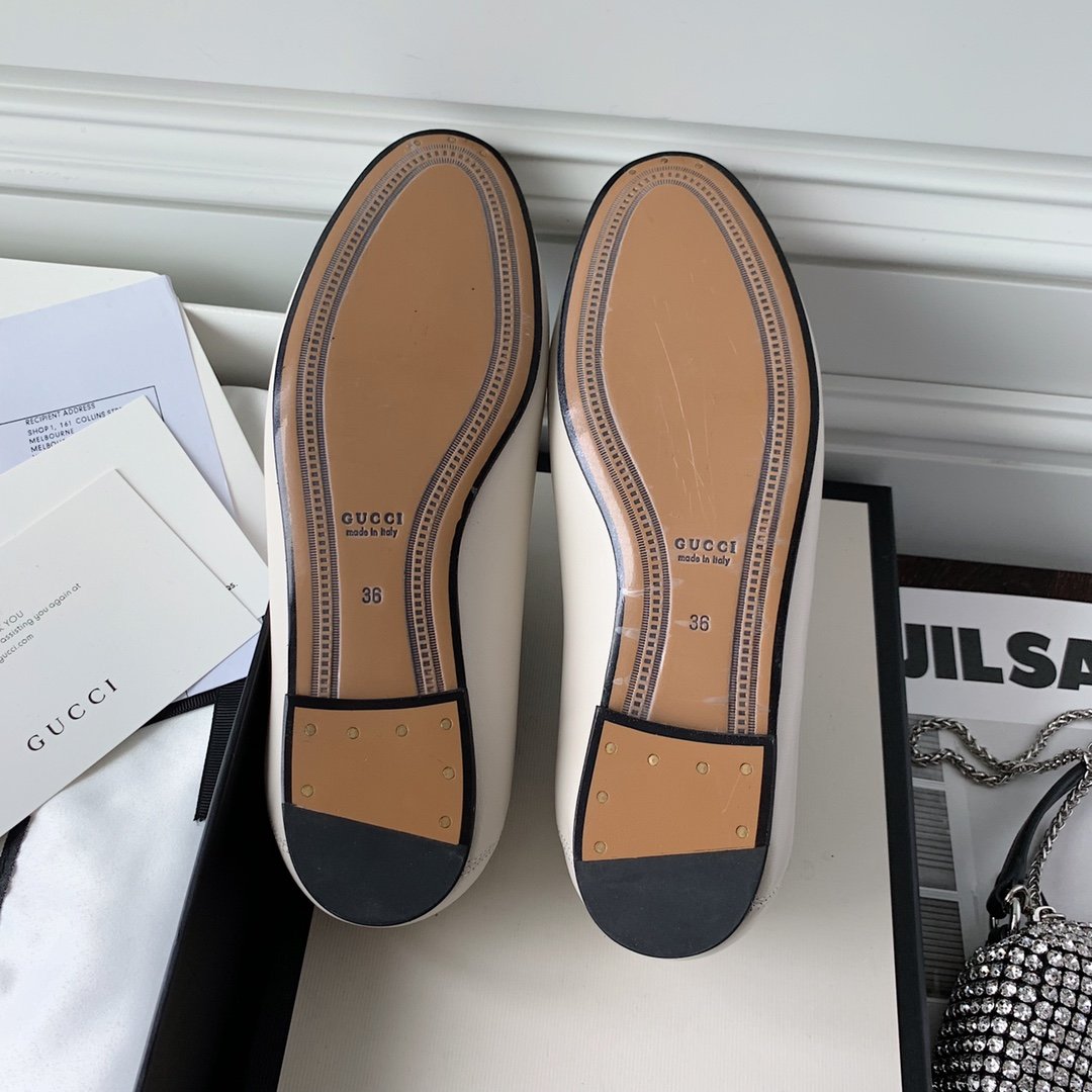 White leather loafer