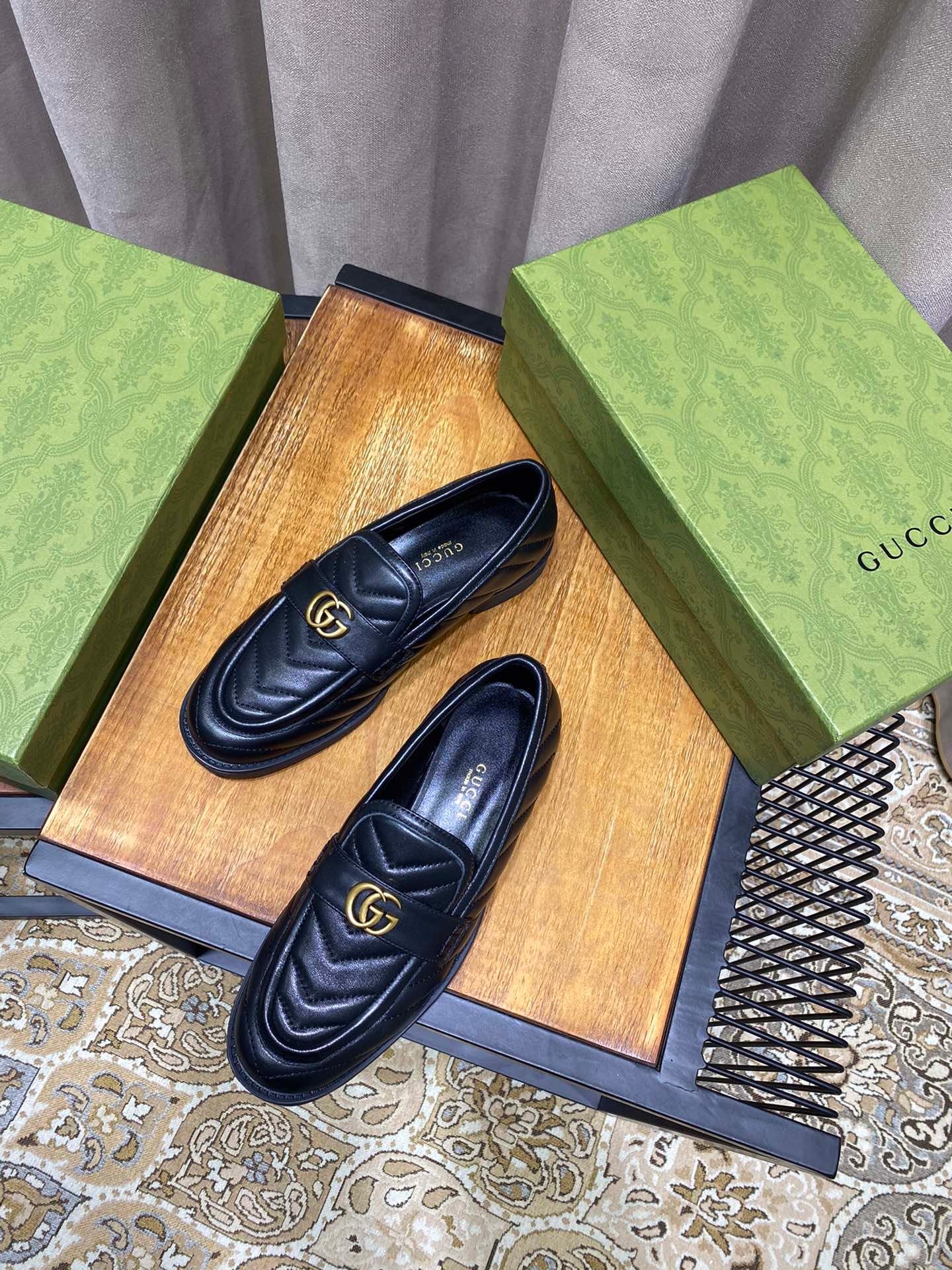 Black chevron matelassé loafers