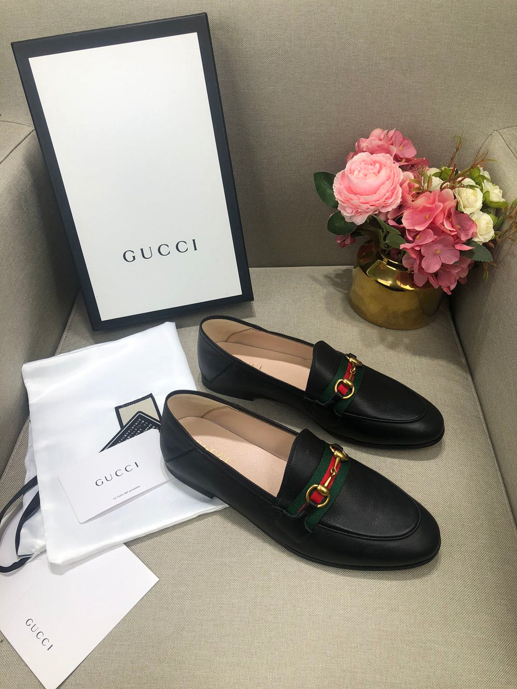 Black loafer with web