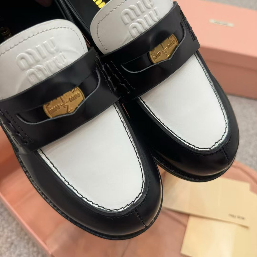 Black/White Penny Loafers