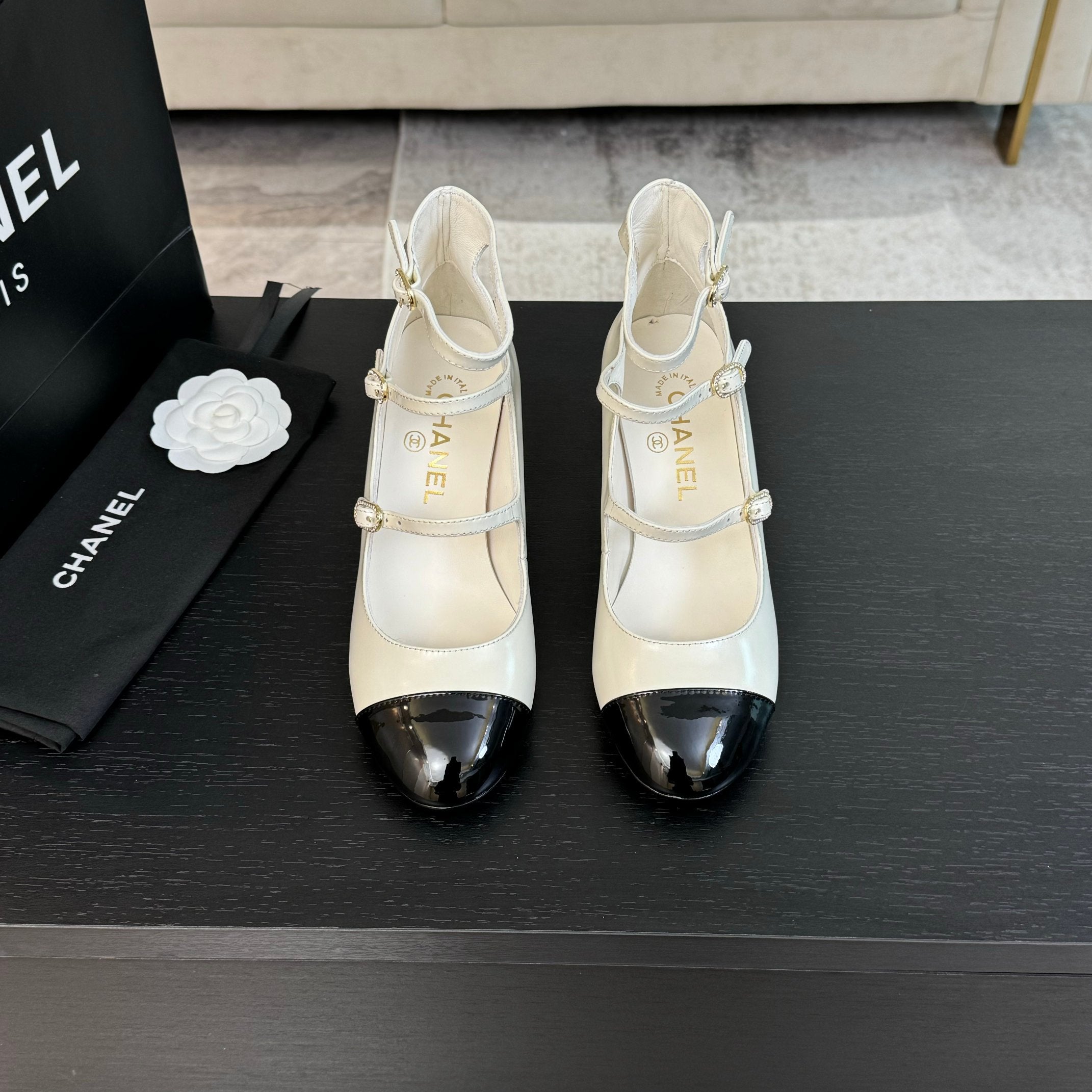 Ivory & Black MJ Pumps