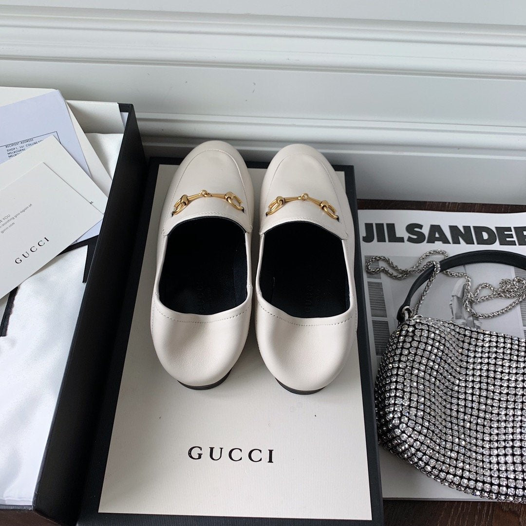 White leather loafer