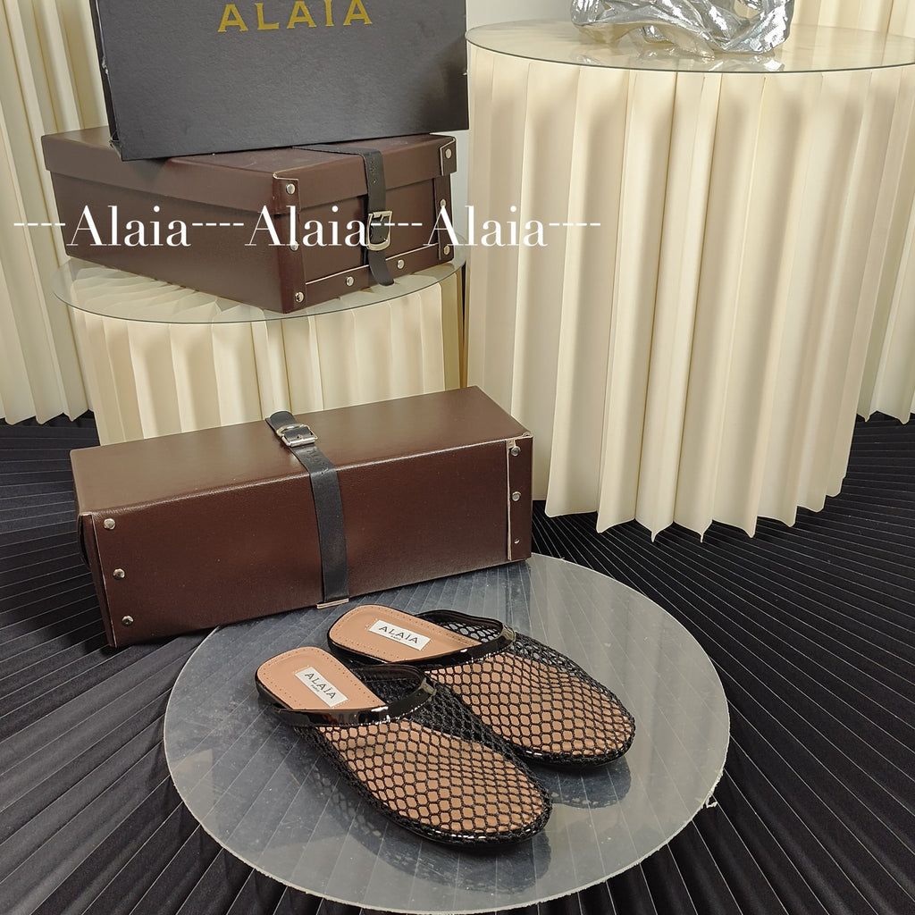 Black Flat Mules In Fishnet