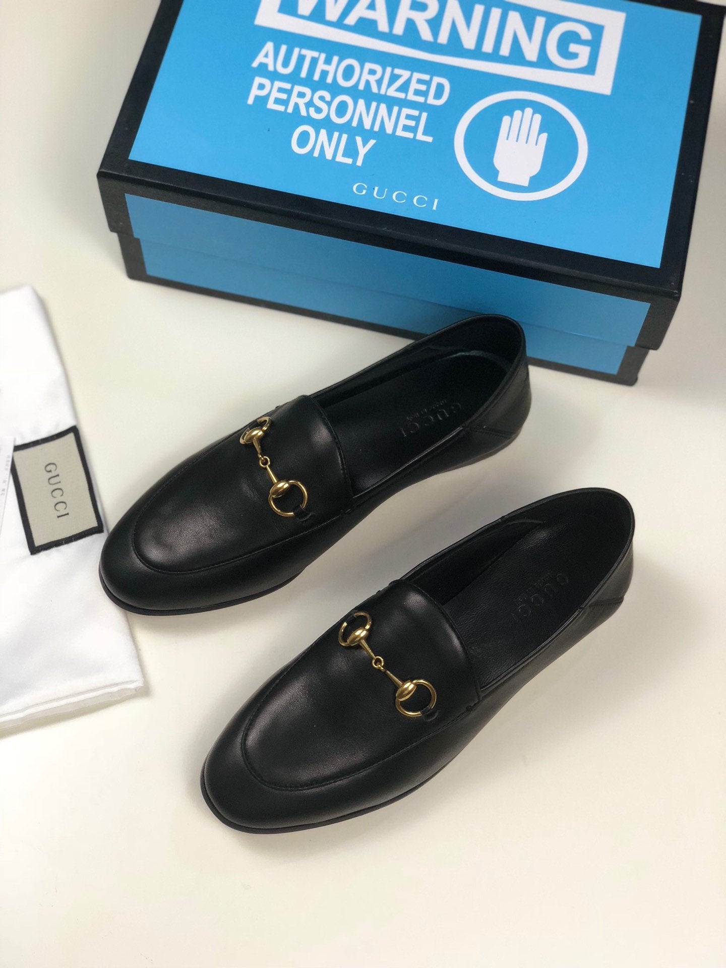 Black GB leather collapsible-heel loafers