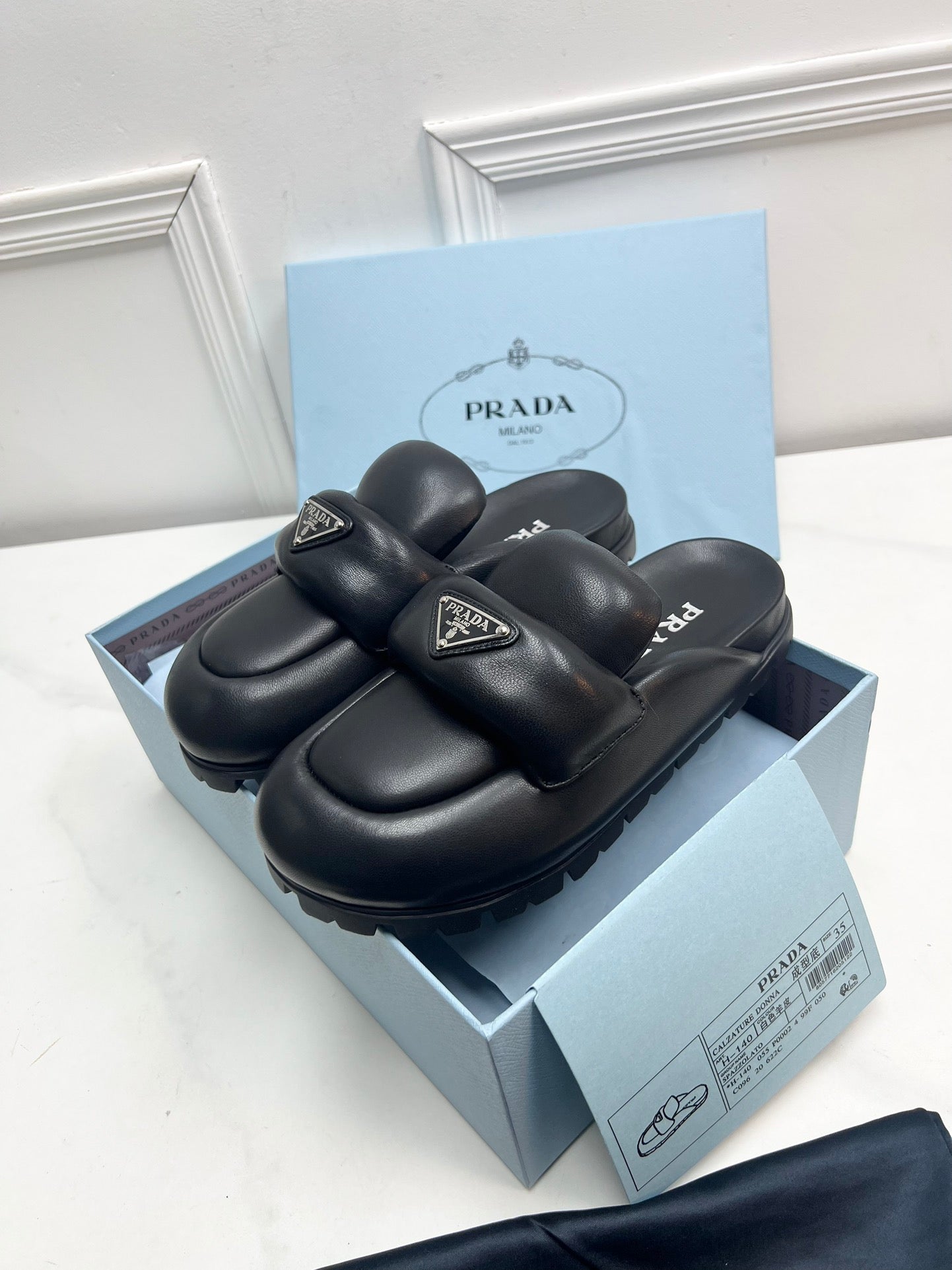 Black P soft padded leather sabots