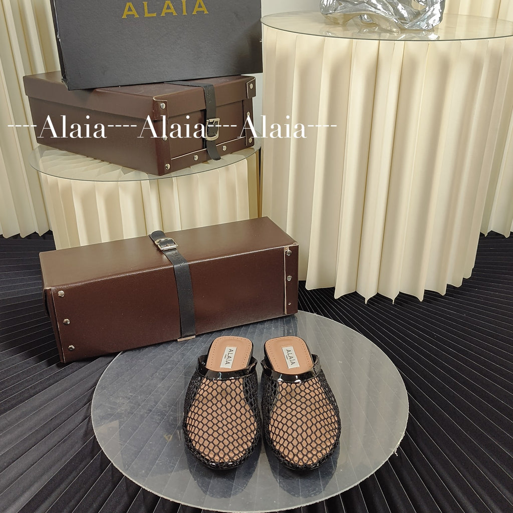 Black Flat Mules In Fishnet