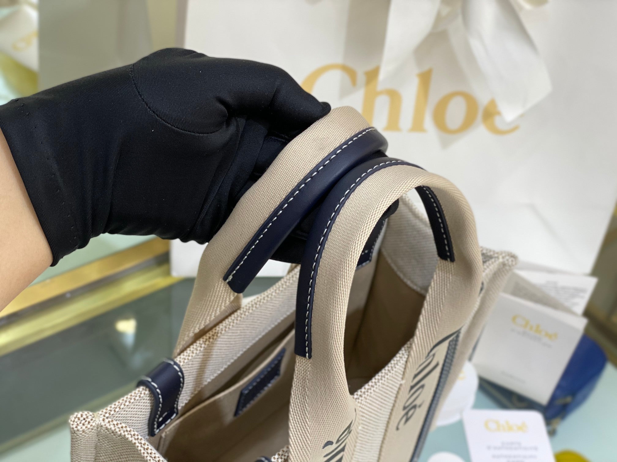 CW small navy leather-trimmed cotton-canvas tote