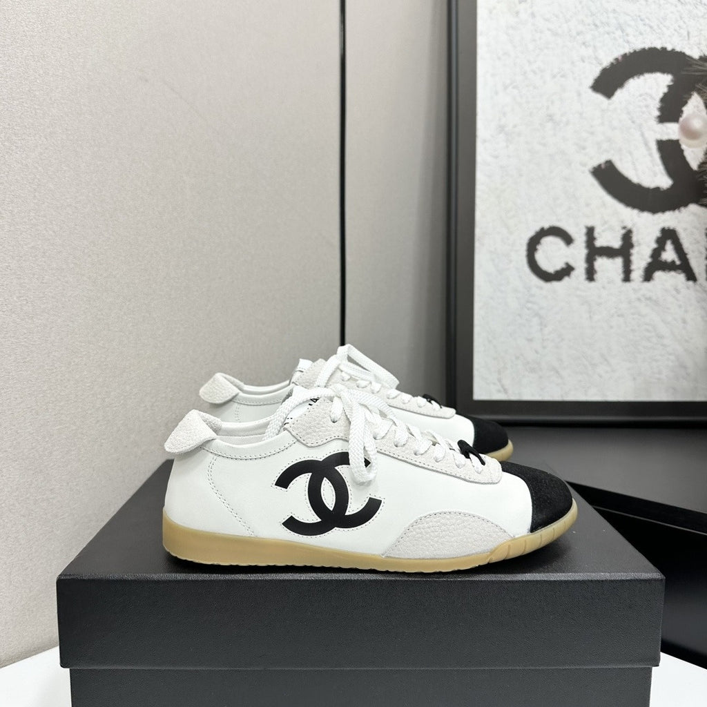 White & Black Embossed Suede Sneakers