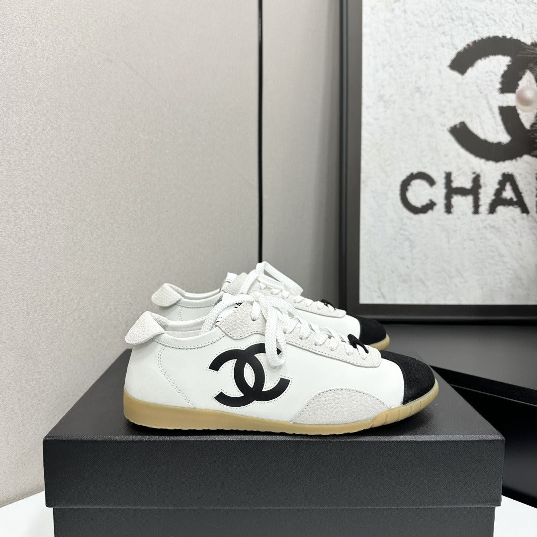 White & Black Embossed Suede Sneakers