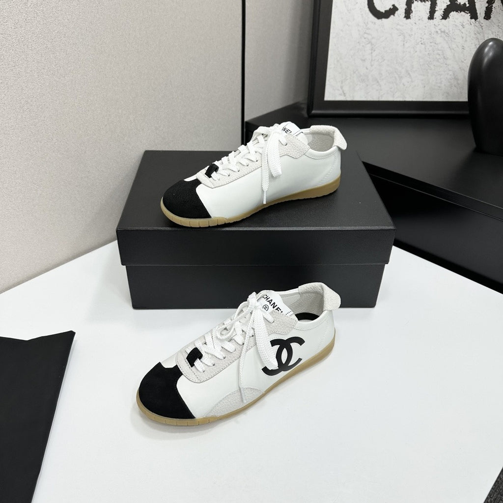White & Black Embossed Suede Sneakers
