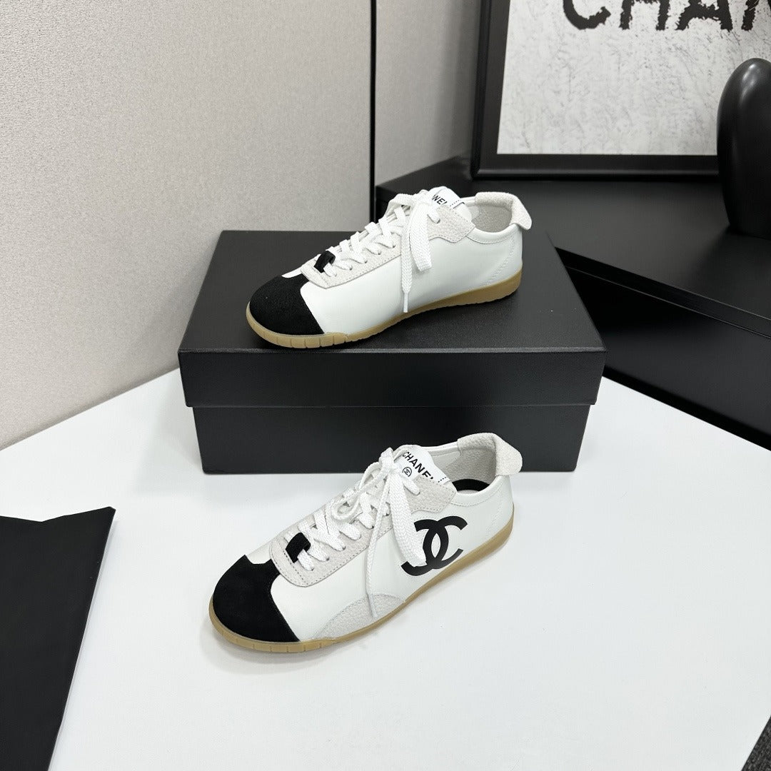 White & Black Embossed Suede Sneakers