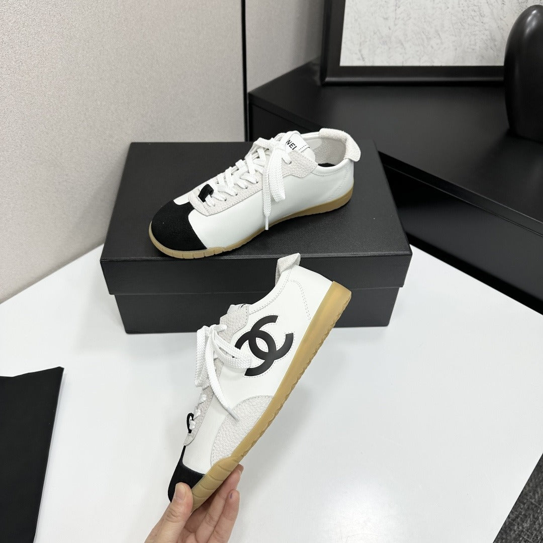 White & Black Embossed Suede Sneakers