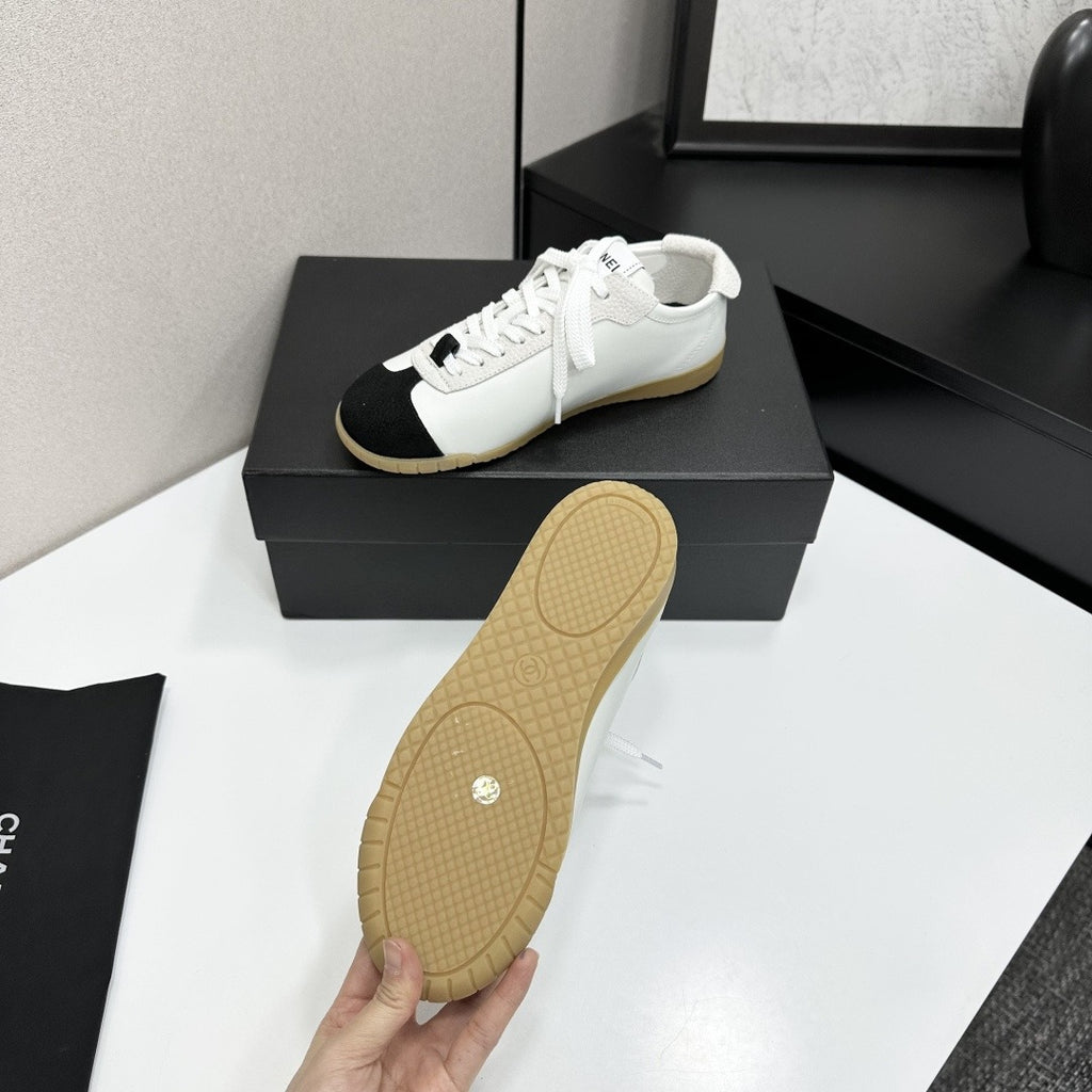 White & Black Embossed Suede Sneakers