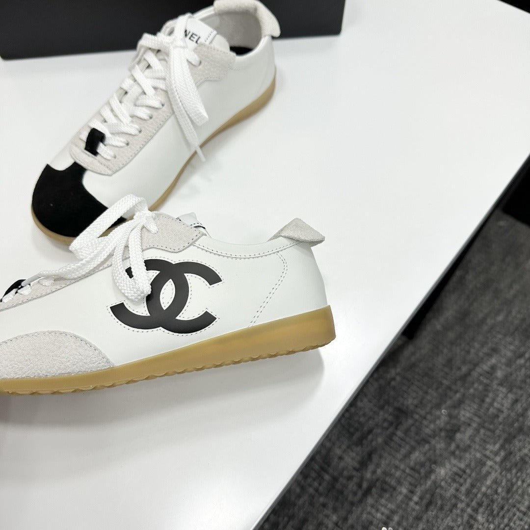 White & Black Embossed Suede Sneakers