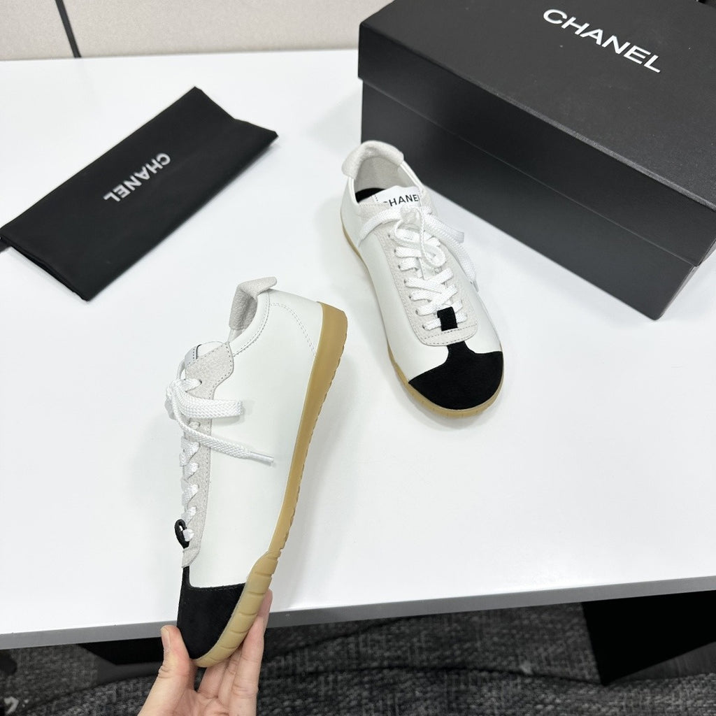 White & Black Embossed Suede Sneakers