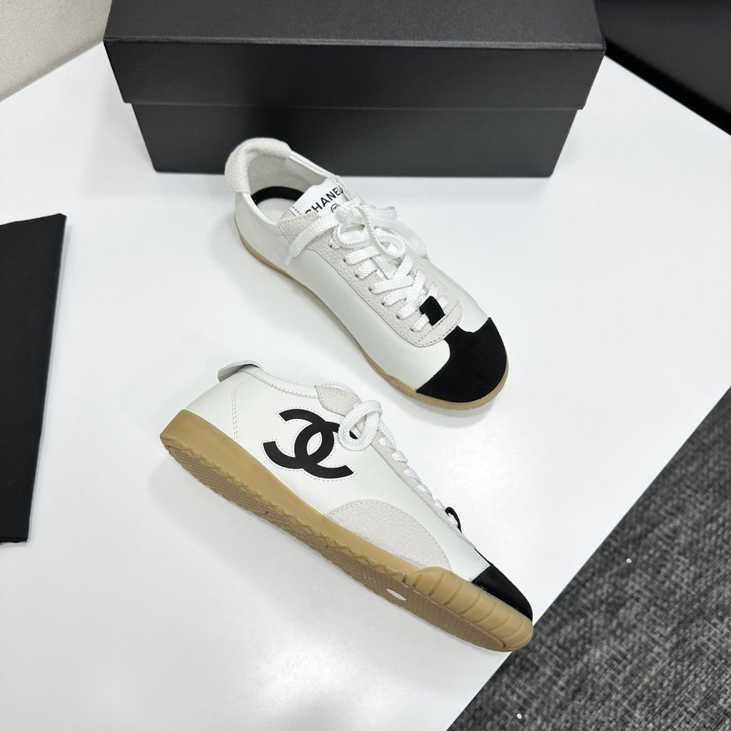 White & Black Embossed Suede Sneakers