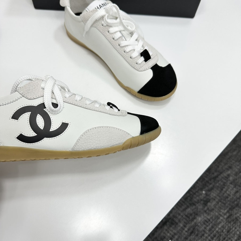 White & Black Embossed Suede Sneakers