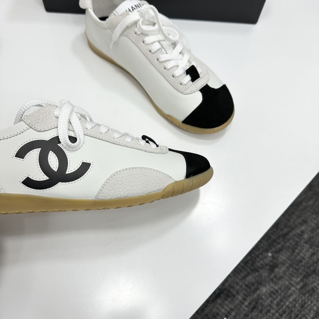 White & Black Embossed Suede Sneakers