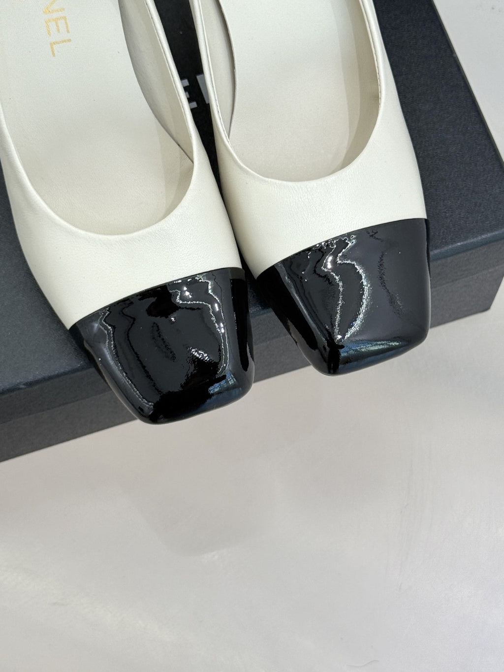 Ivory & Black Pumps