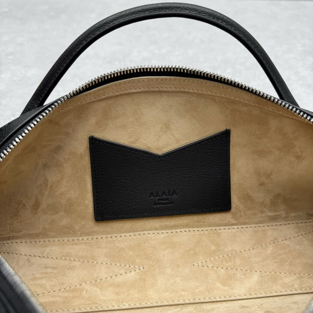 Black Le Teckel Clutch