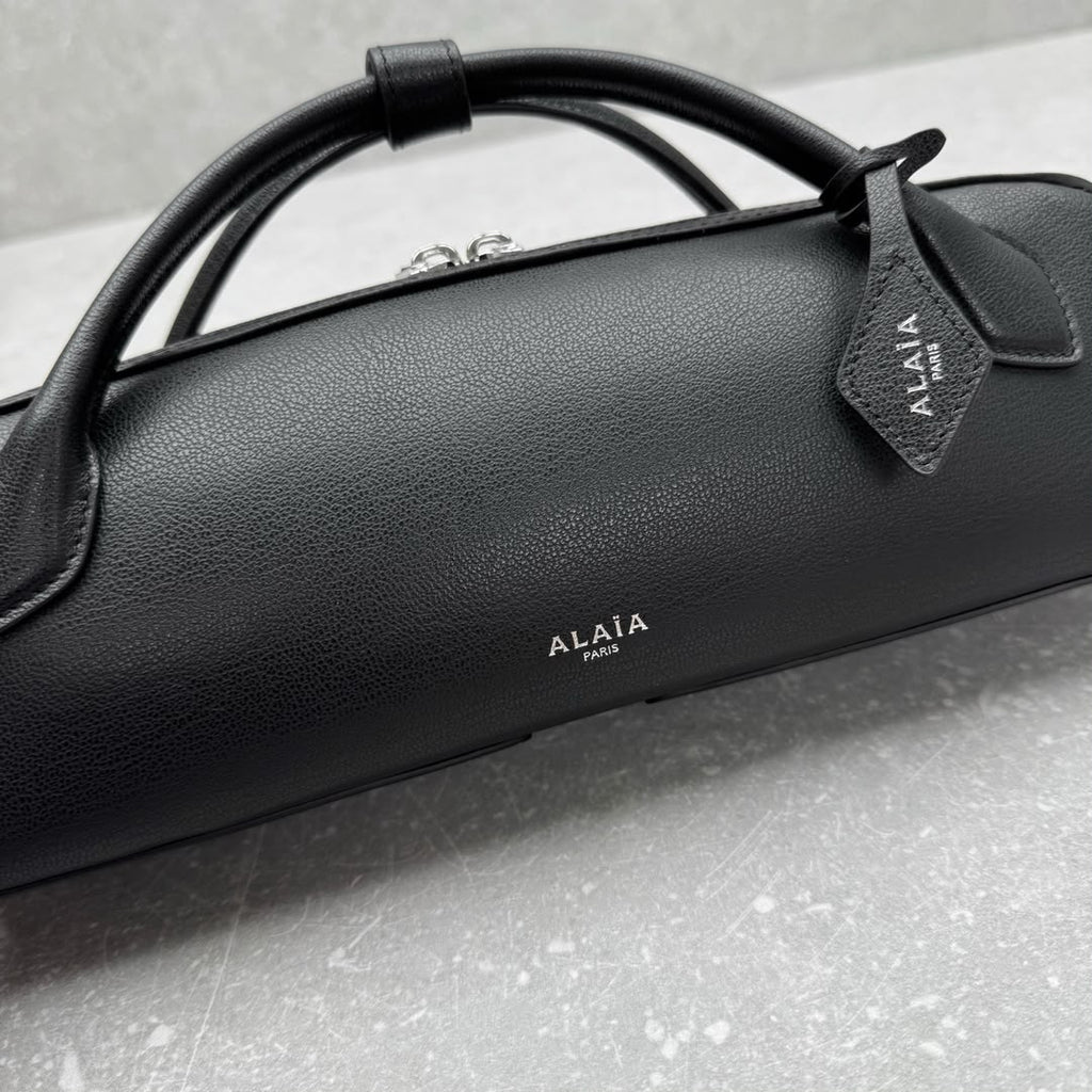 Black Le Teckel Clutch