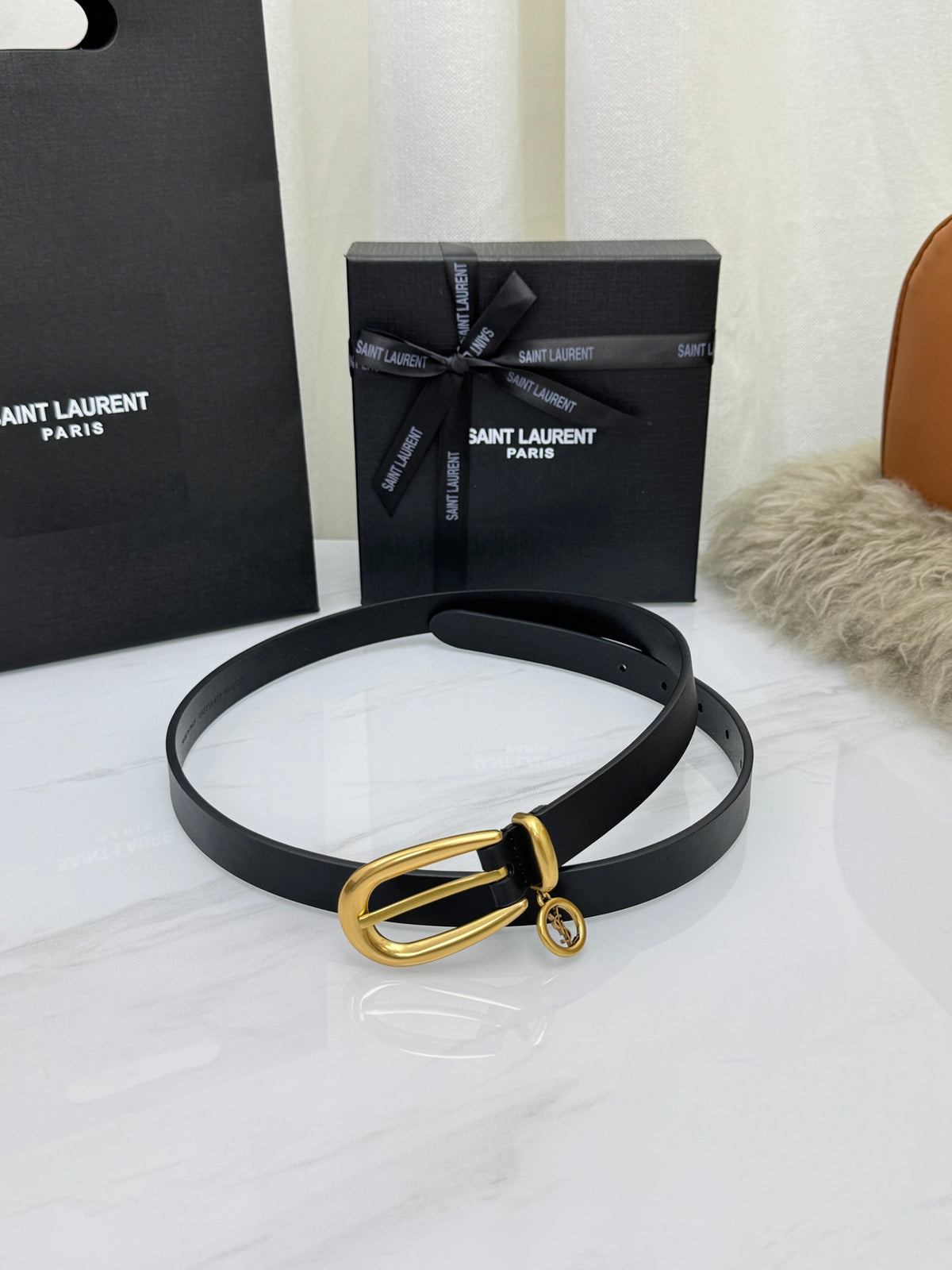 Black Cassandre Charm Elongated Buckle Thin Belt In Leather