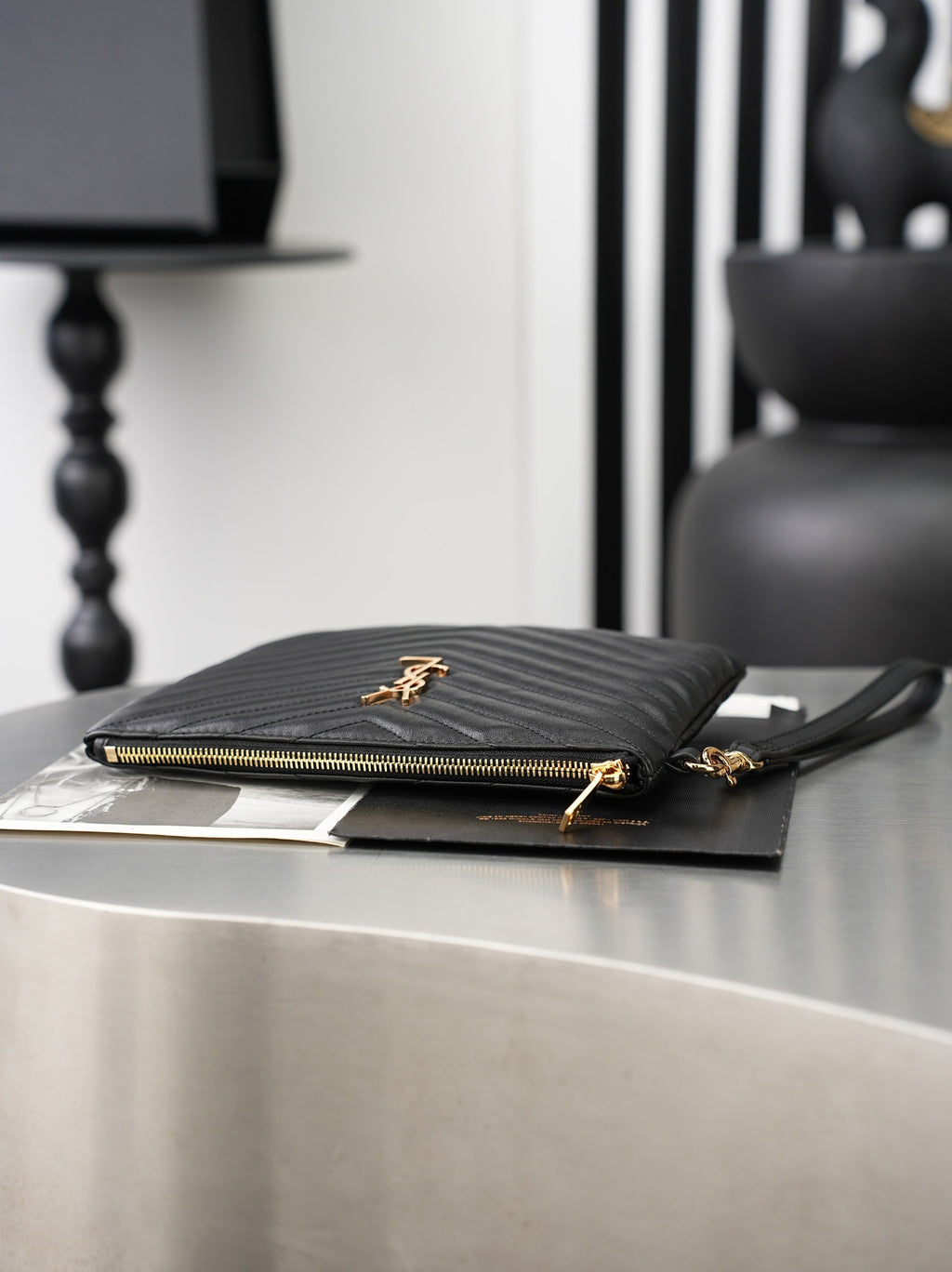 Black Cassandre Matelassé A5 Pouch In Leather