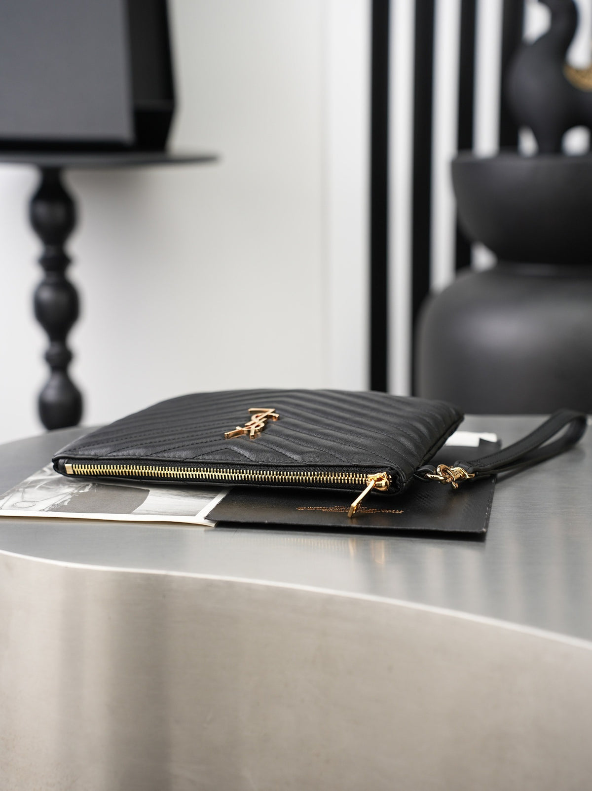 Black Cassandre Matelassé A5 Pouch In Leather