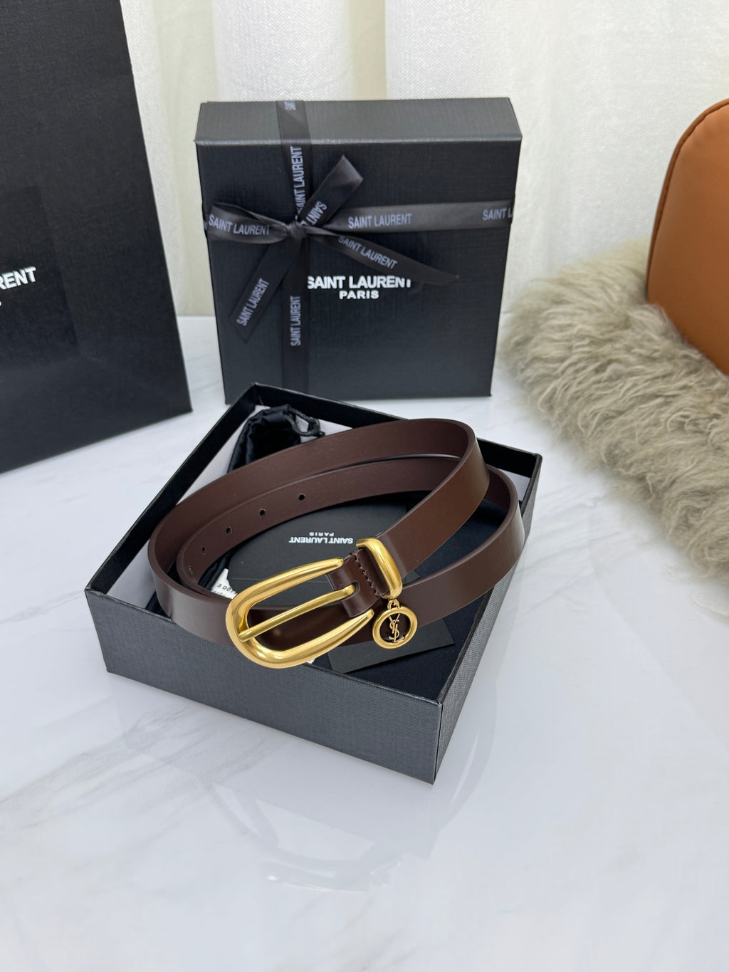 Burnt Chocolate Cassandre Charm Elongated Buckle Thin Belt In Leather