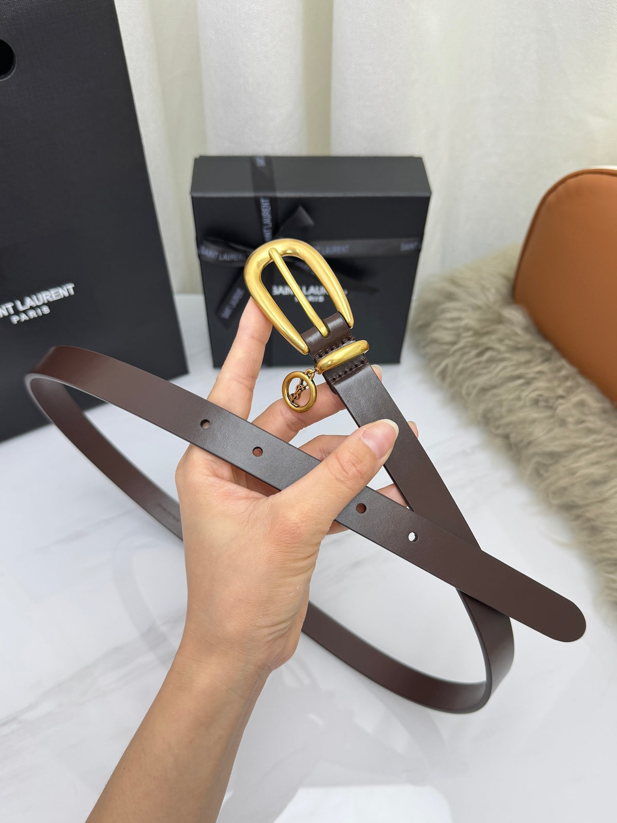 Burnt Chocolate Cassandre Charm Elongated Buckle Thin Belt In Leather