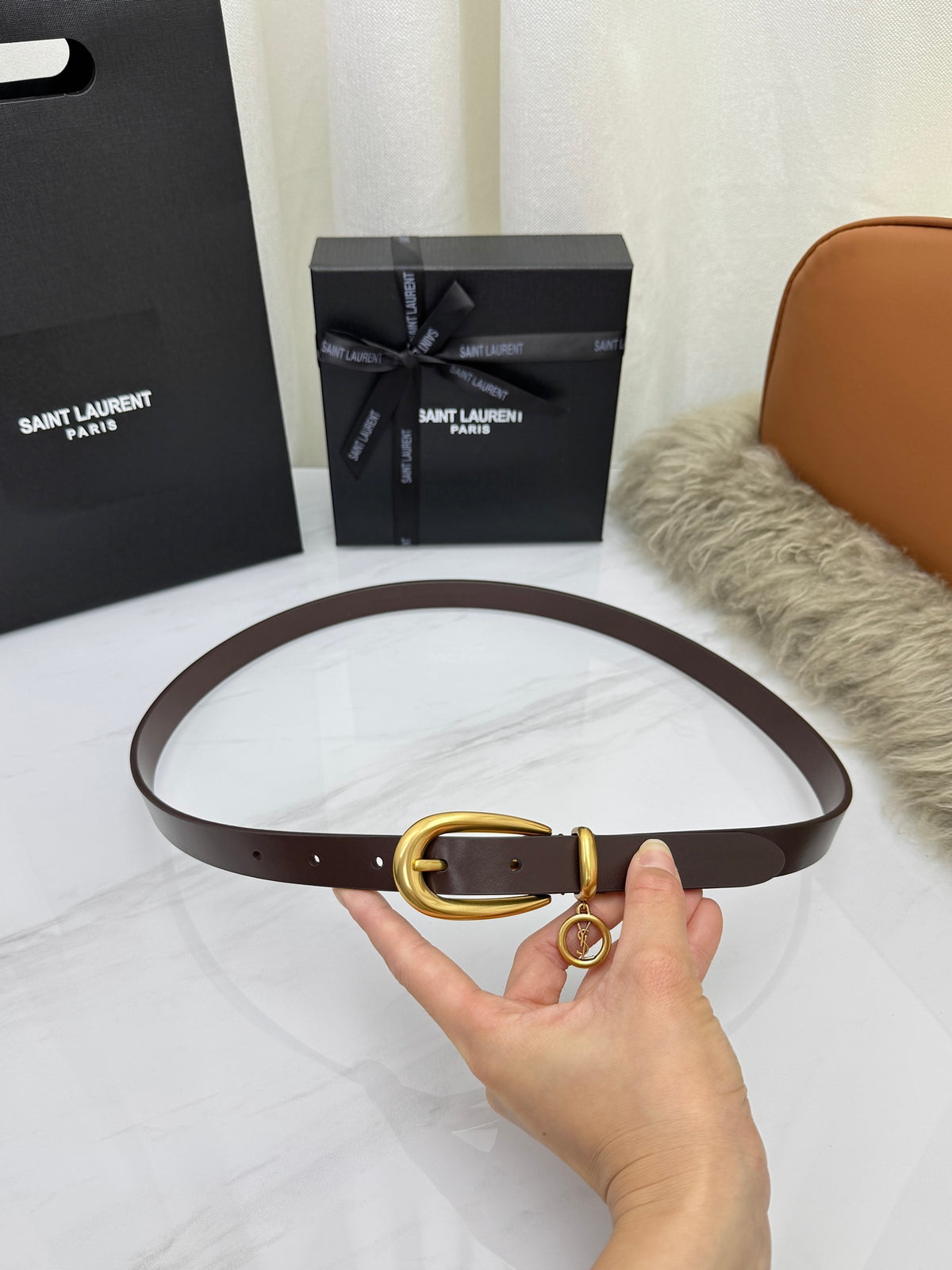 Burnt Chocolate Cassandre Charm Elongated Buckle Thin Belt In Leather