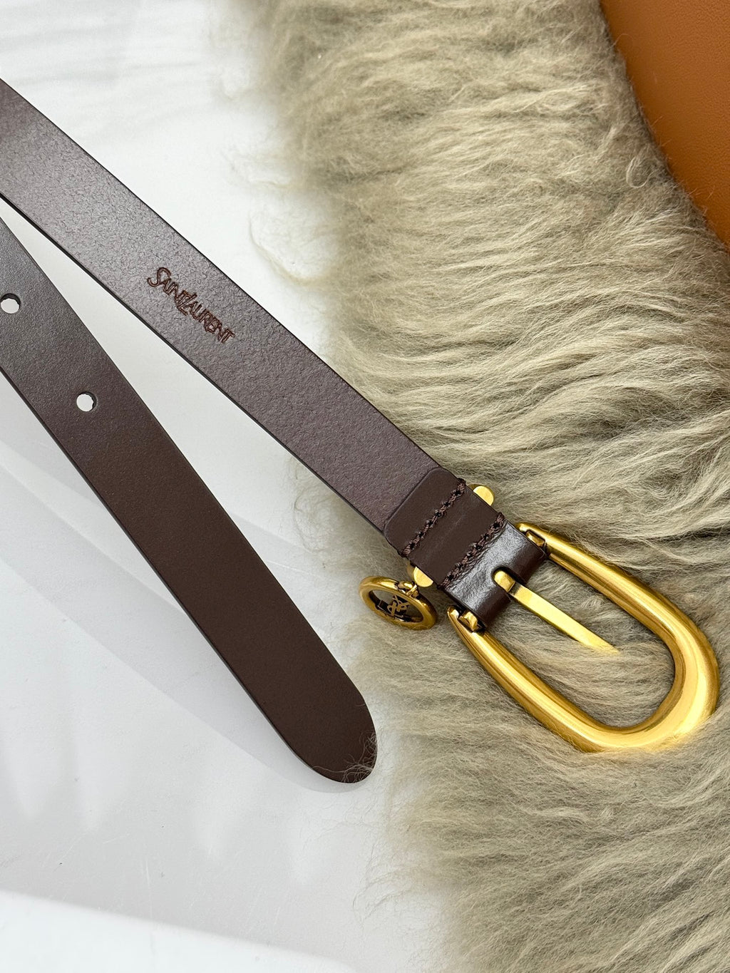 Burnt Chocolate Cassandre Charm Elongated Buckle Thin Belt In Leather